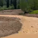 В ВКО очевидцы сняли на видео «апельсиновую» реку возле Юбилейно-Снегирихинского рудника