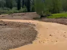 В ВКО очевидцы сняли на видео «апельсиновую» реку возле Юбилейно-Снегирихинского рудника